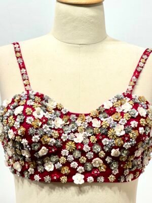 Metallic hues hand embroidered sleeveless blouse
