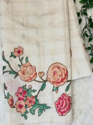 Checks organza sarees with applique
work and floral blouse