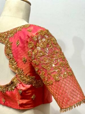 Netted sleeves with zardosi aari/maggam handwork blouse
