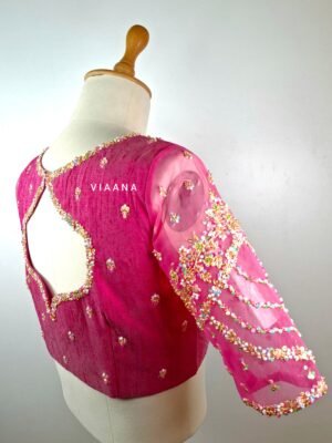 Minimal and elegant pastle sequins and Zardozi Embroidered blouse with net sleeves