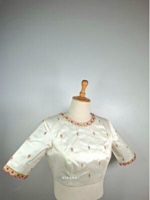Floral zari and threadwork embroidery with scallop cut sleeves