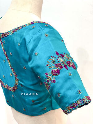 Floral zardozi and threadwork embroidery with net on back and cutwork sleeves