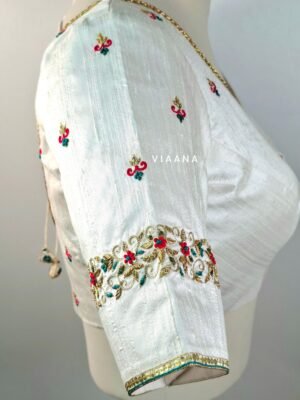 Timeless red and green combination floral embroidery blouse with exclusive sleeves design