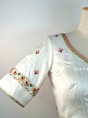 Timeless red and green combination floral embroidery blouse with exclusive sleeves design