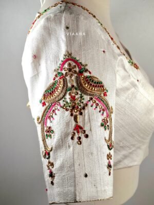 Classic peacock embroidery made with stones and Zardozi
