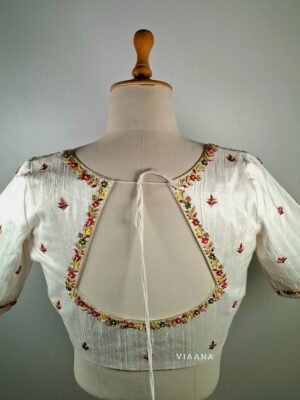 Multicolor floral embroidery with unique sleeves designed white blouse